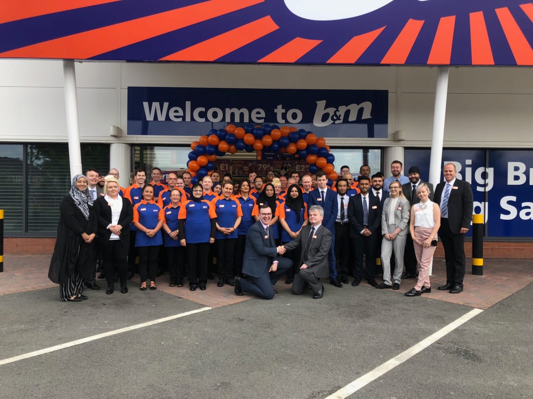 B&M's store team celebrate the opening of their brand new store, following a relocation at St Andrew's Retail Park, Small Heath.