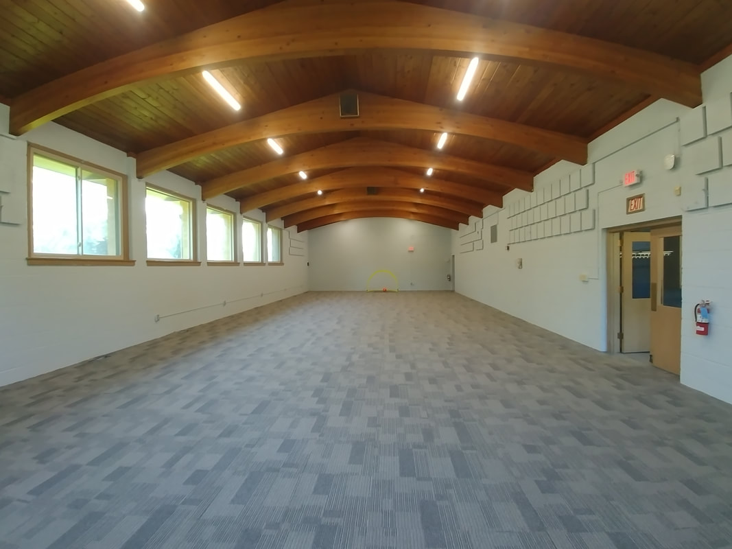 This open multi-purpose room at Progeny Academy offers flexible space for physical education, student programs, assemblies, and collaborative school events. Supporting the academy's mission of developing leadership, teamwork, and academic success, the facility provides students with opportunities to learn and grow beyond the classroom in Brooklyn Center, Minnesota.