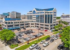 Modern medical office building in Dallas offering specialized cosmetic gynecology, sexual health, and women’s wellness services.