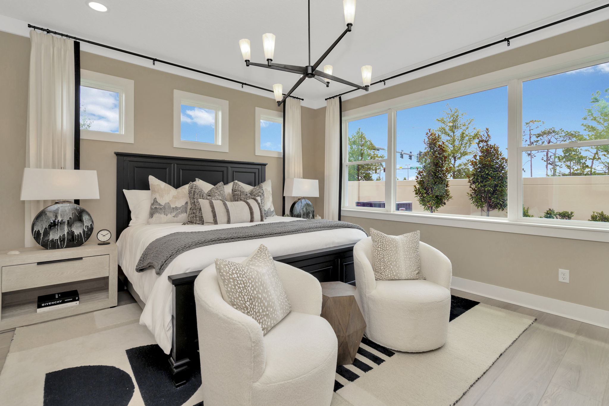 The Primary Bedroom of DRB Homes Cocoplum Home Plan at Primrose at Longleaf in New Port Richey, FL.