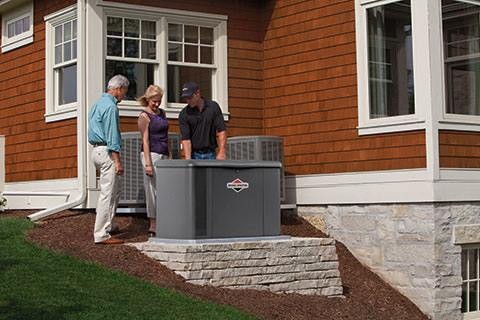 The Reckingers at work repairing Briggs and Stratton generator