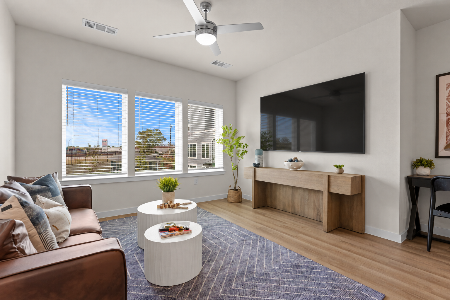 Two-bedroom living room at Cyrus Apartments off Ed Bluestein Blvd. 
