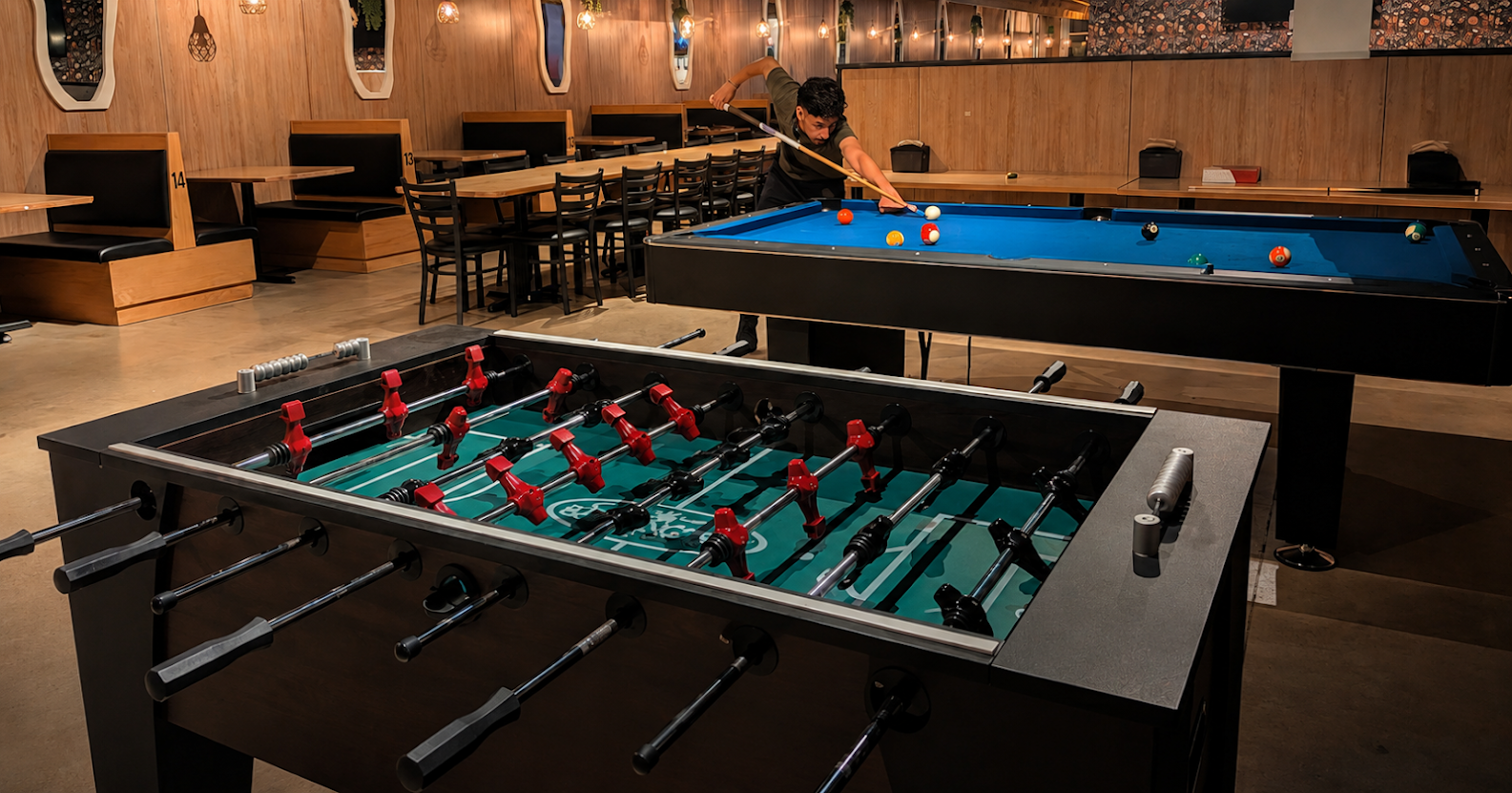Indoor Sitting with Pool Table and Football Table 