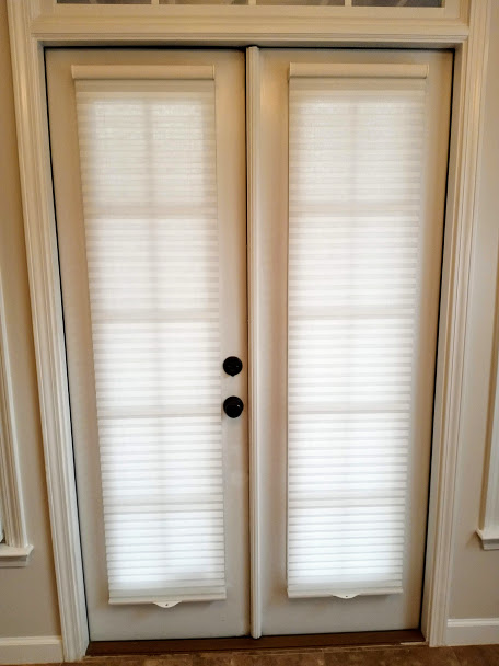 Don’t you just hate having blinds on your door? They are a necessity for privacy but they make noise when you swing open the door. Luckily there is another solution! Cellular shades have a tight fit to the door for ultimate privacy and are secured at both the top and bottom of the shade