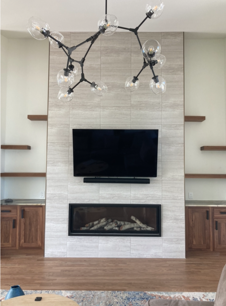 Custom fireplace surround and built-in remodel by Marcotte Remodeling in Boulder, CO