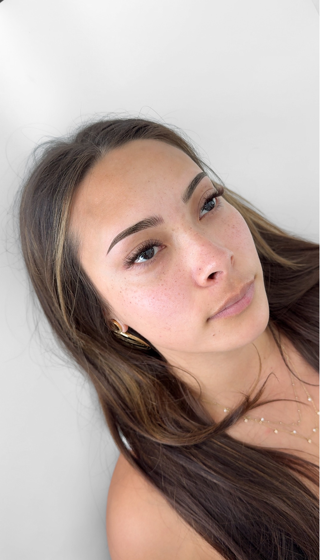 Flawless combination brows in Riverton, Utah, blending nano hair strokes with soft ombr&eacute; shading for a natural yet defined look.