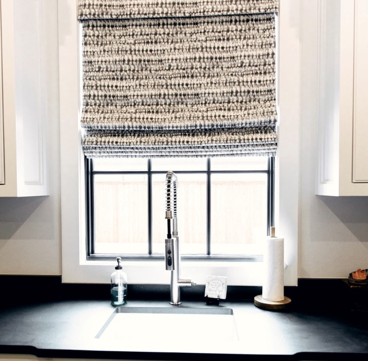 Roman Shades add the perfect texture and style to your kitchen. Budget Blinds of Rockwall, Terrell, and Greenville offers the best selection of premium, desginer fabrics to fit any unique taste.