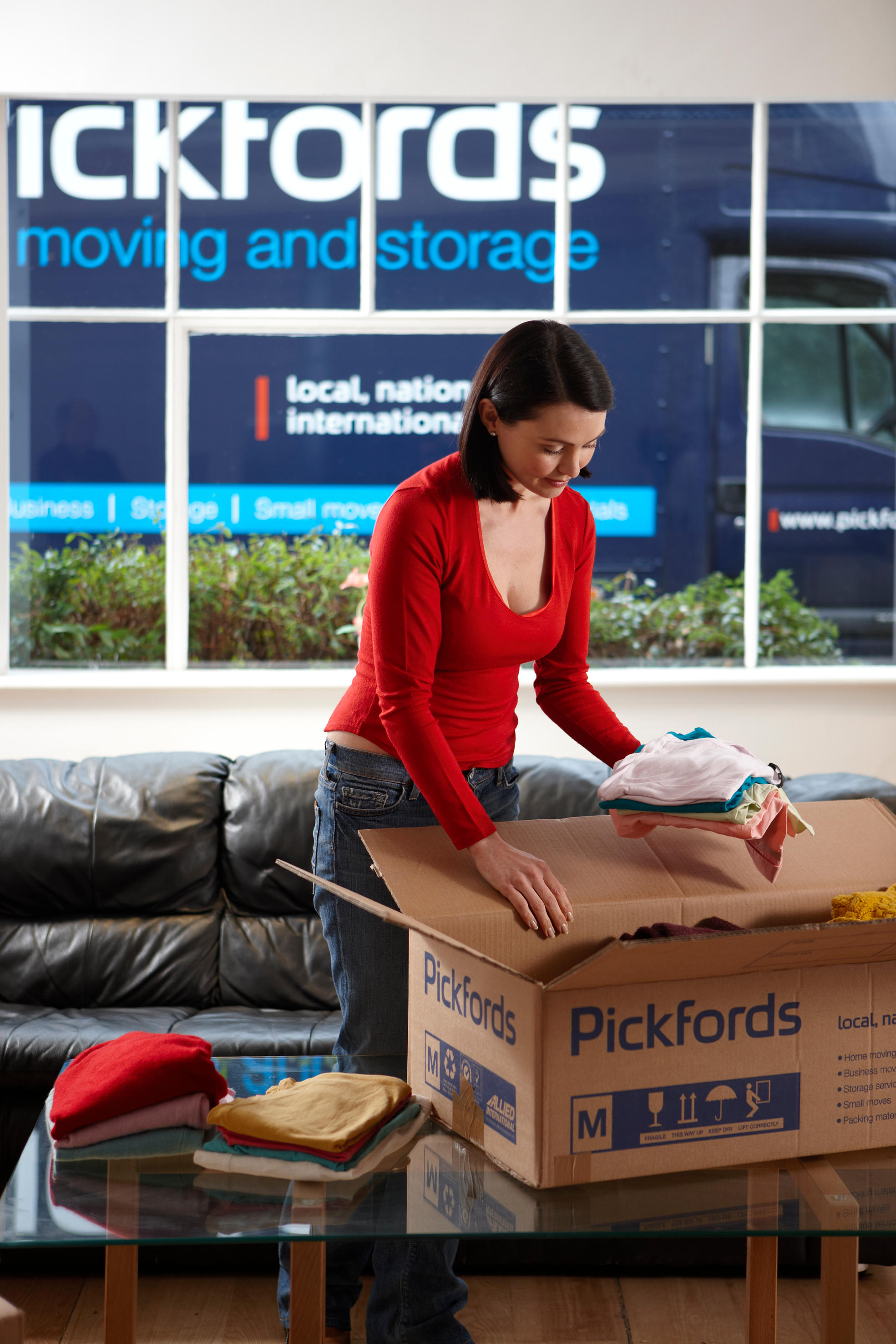 Customer packing using a Pickfords box Pickfords Edinburgh 01315 522853