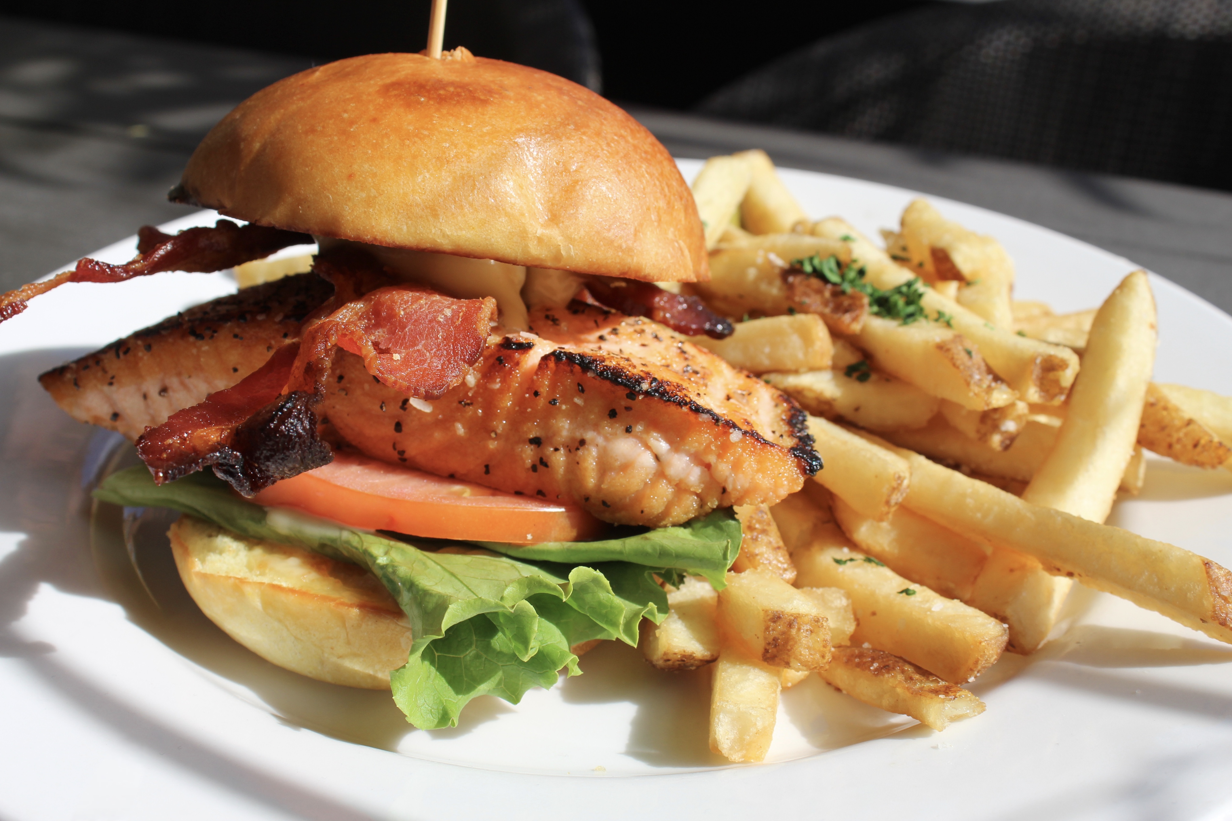 Salmon BLT Sandwich served with fries 