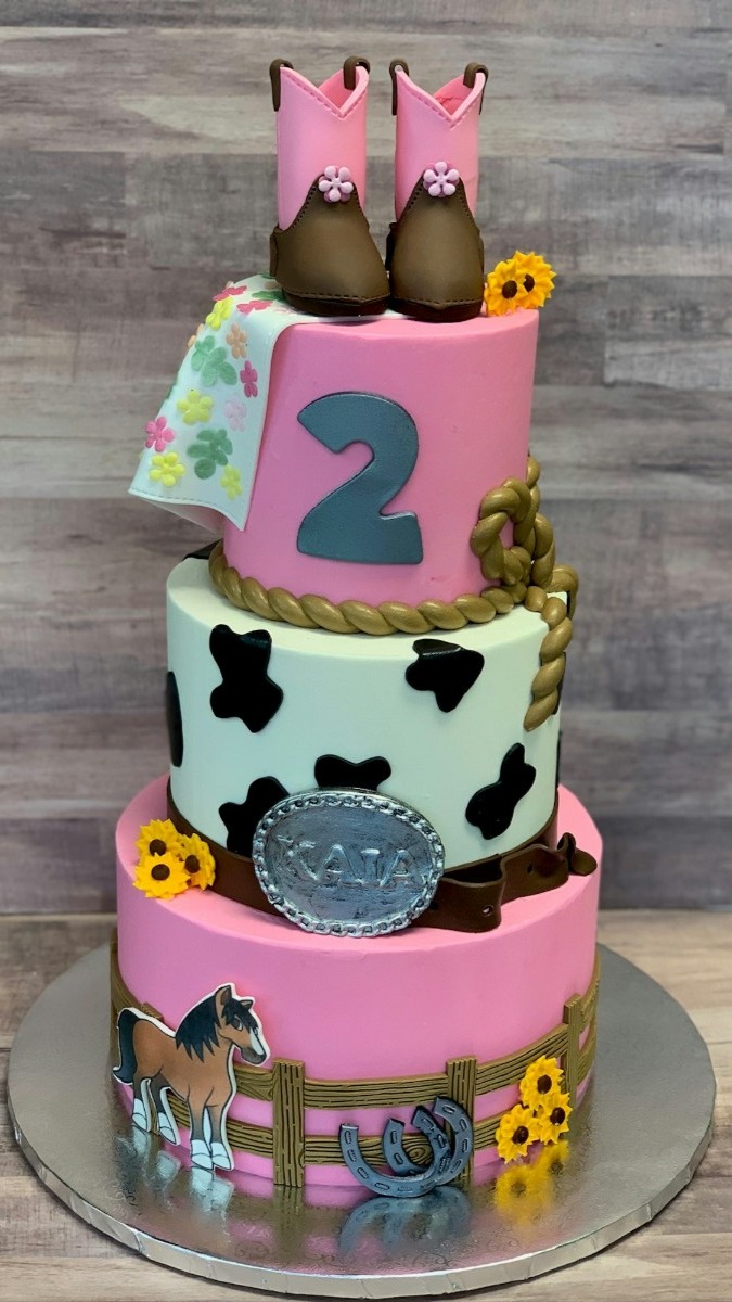 Custom themed birthday cakes available from a local bakery. 