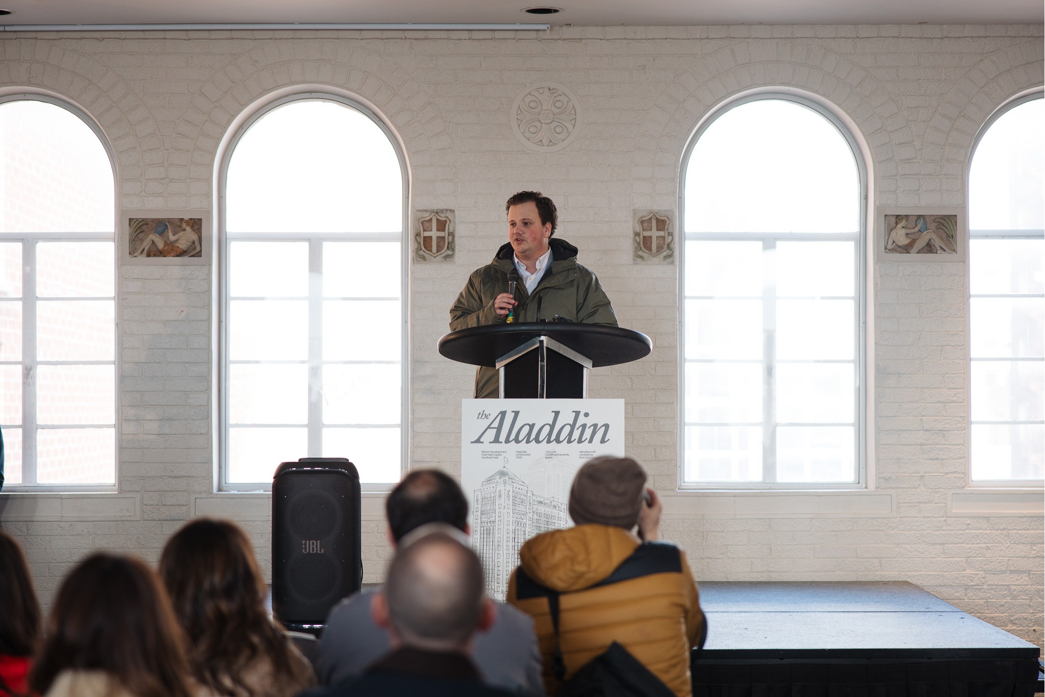 Leadership presentation by Molzer Development discussing real estate development strategy, adaptive reuse, and community-driven projects in Kansas City.