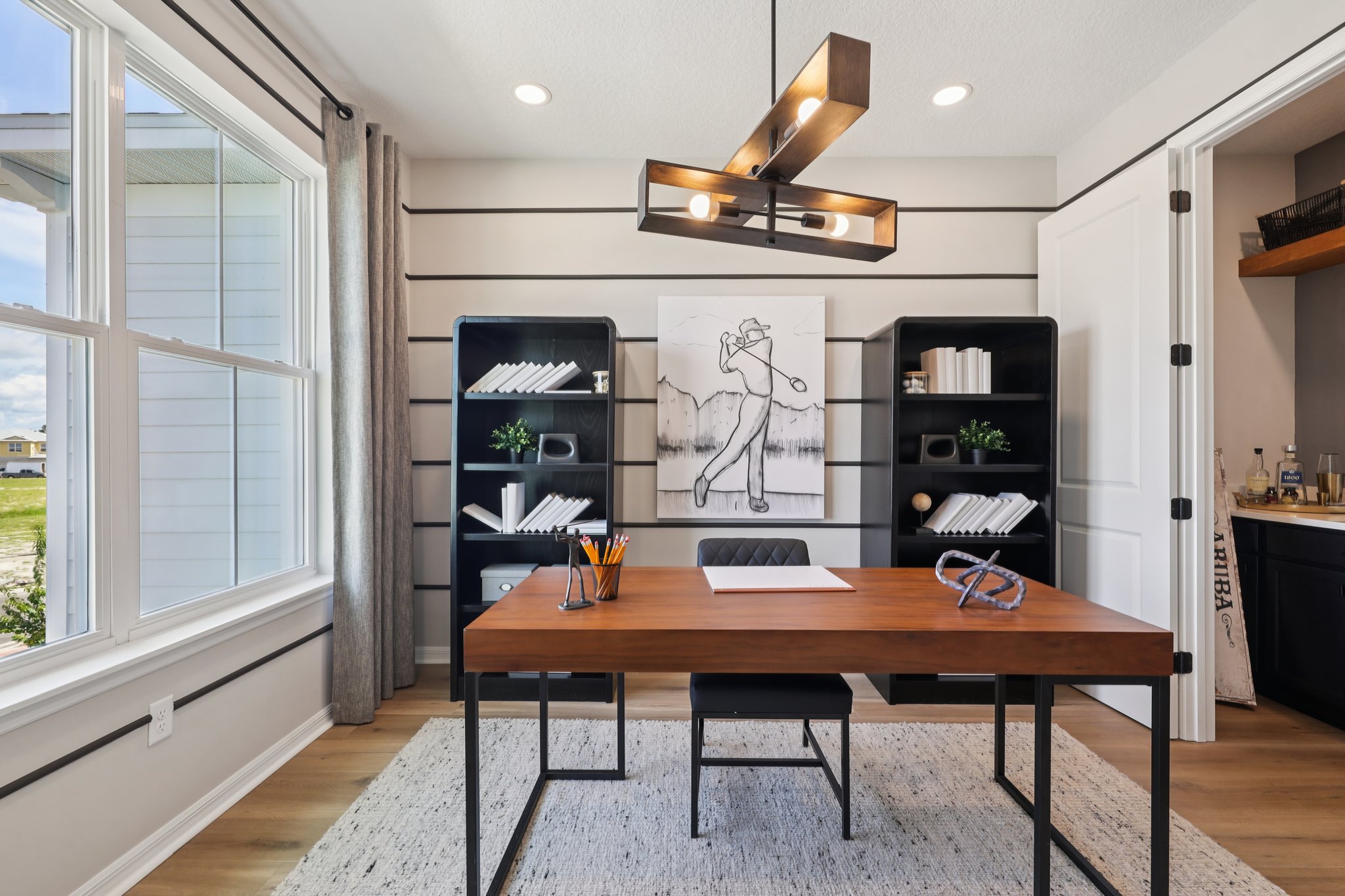 The Second Bedroom staged as an Office of a DRB Homes Aruba Home Plan at Isla Mirada in San Antonio, 