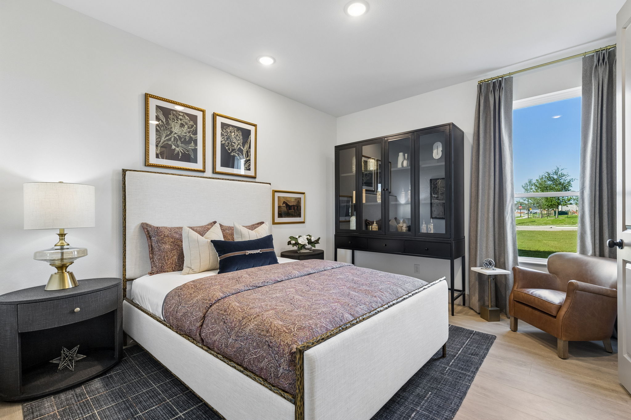 Secondary bedroom in the Rainwater Crossing model home in Celina, TX.