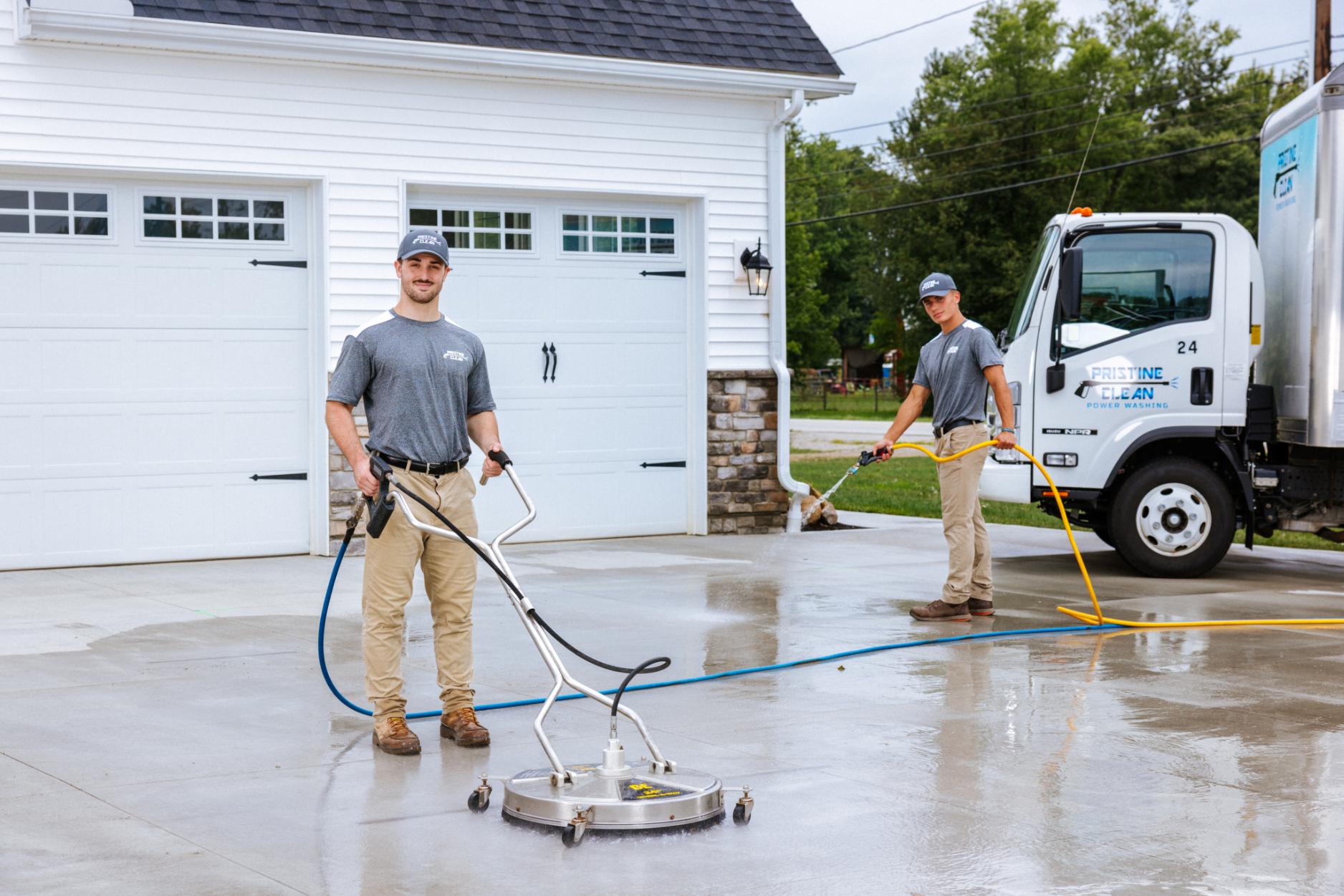 Pristine Clean Employee Concrete Pressure Washing and Sealing