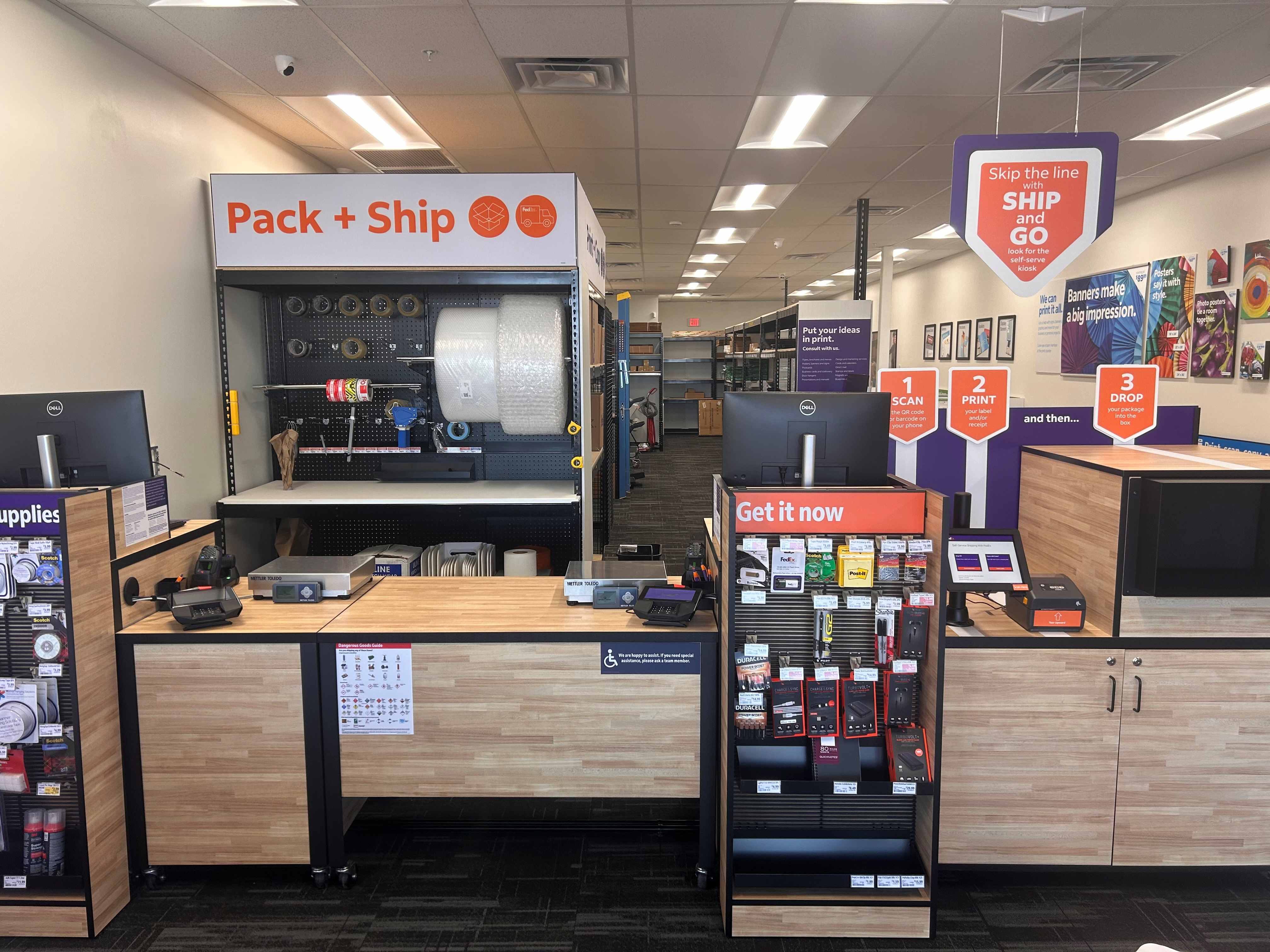 The dedicated Pack + Ship station at the Mesa location, featuring packing materials, scales, and a s 
