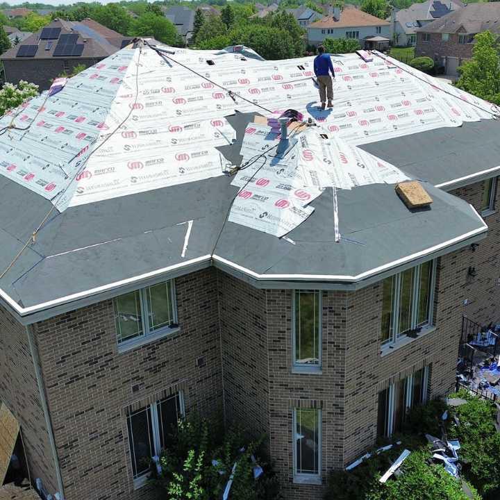 Images Roofing Gurus - Licensed roofing contractors for Roof Replacement & Leak Repair Chicago