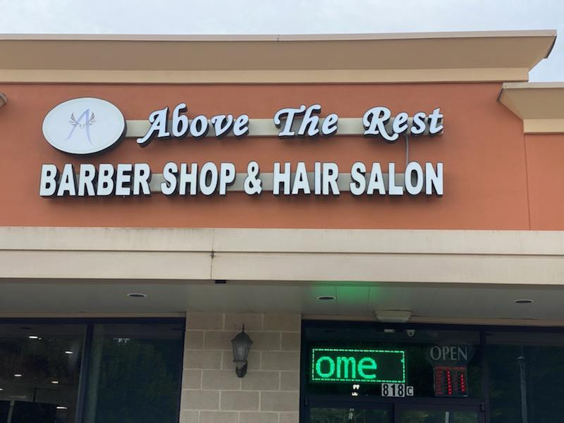 Above The Rest Barber and Beauty LLC Logo