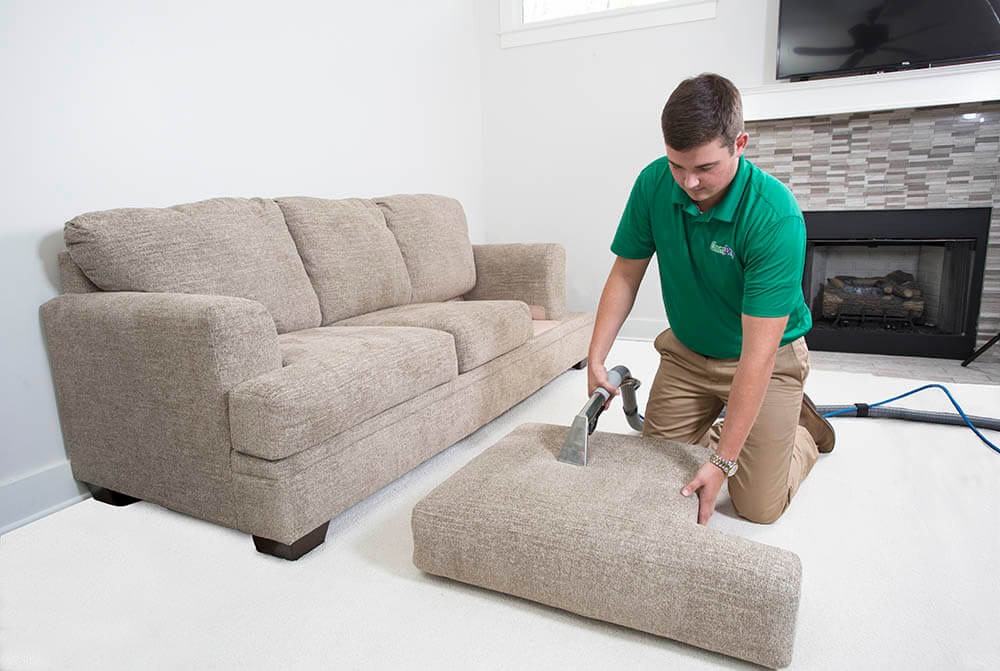 Southside Chem-Dry technician performing upholstery cleaning in Virginia Beach