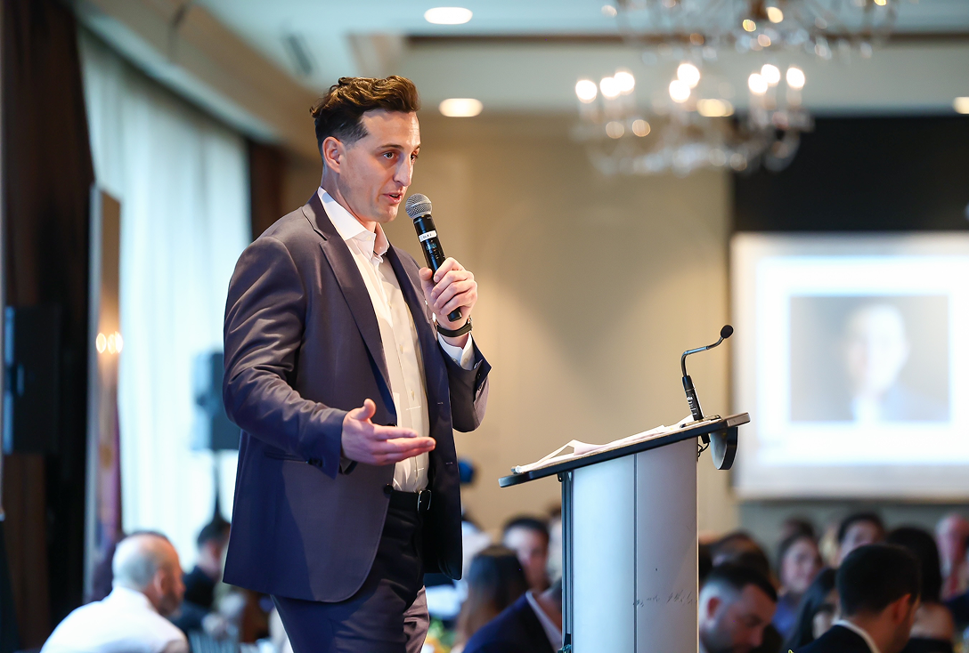 Collin Zwickel giving a speech at the 2024 Zajac Nights Gala.