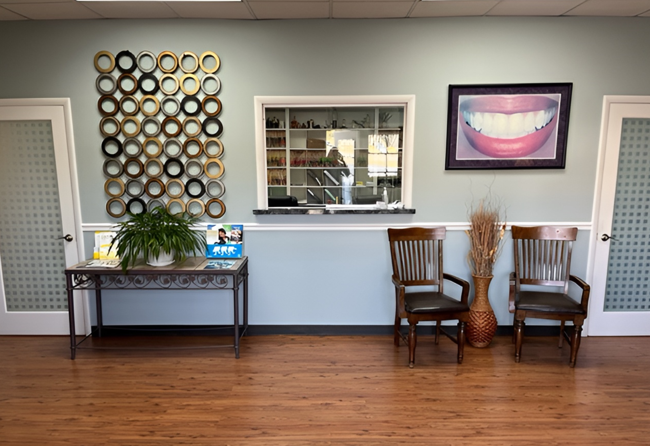Reception area at Hill Family Dental Columbia with welcoming décor and a friendly patient check-in space.