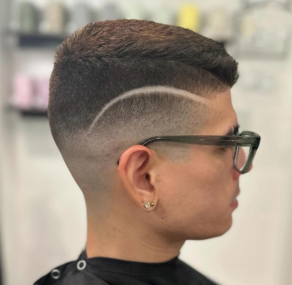 Mid Skin Fade Haircut with Design