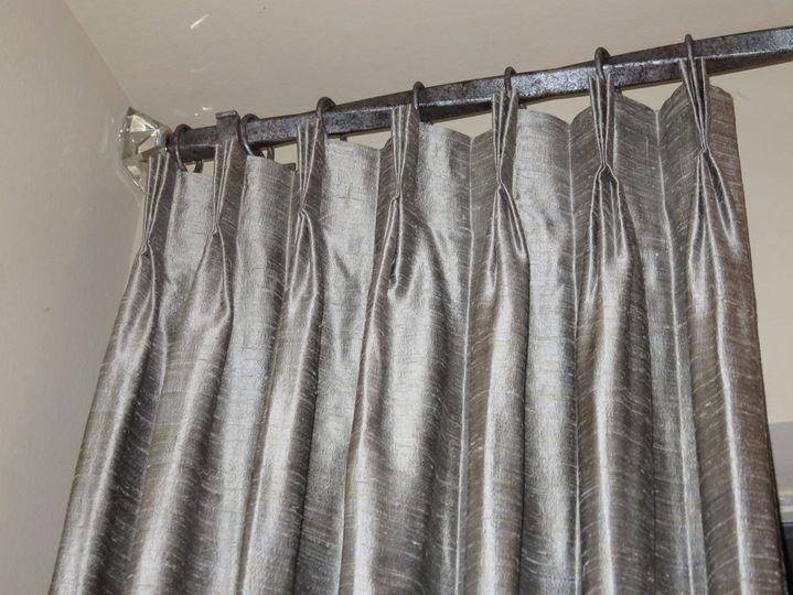 This closeup comes from a recent job in Katy! Not only do these silver drapes look amazing, but check out the rings, rod, and hardware, too. All matching—and with a crystal finial to finish the look!