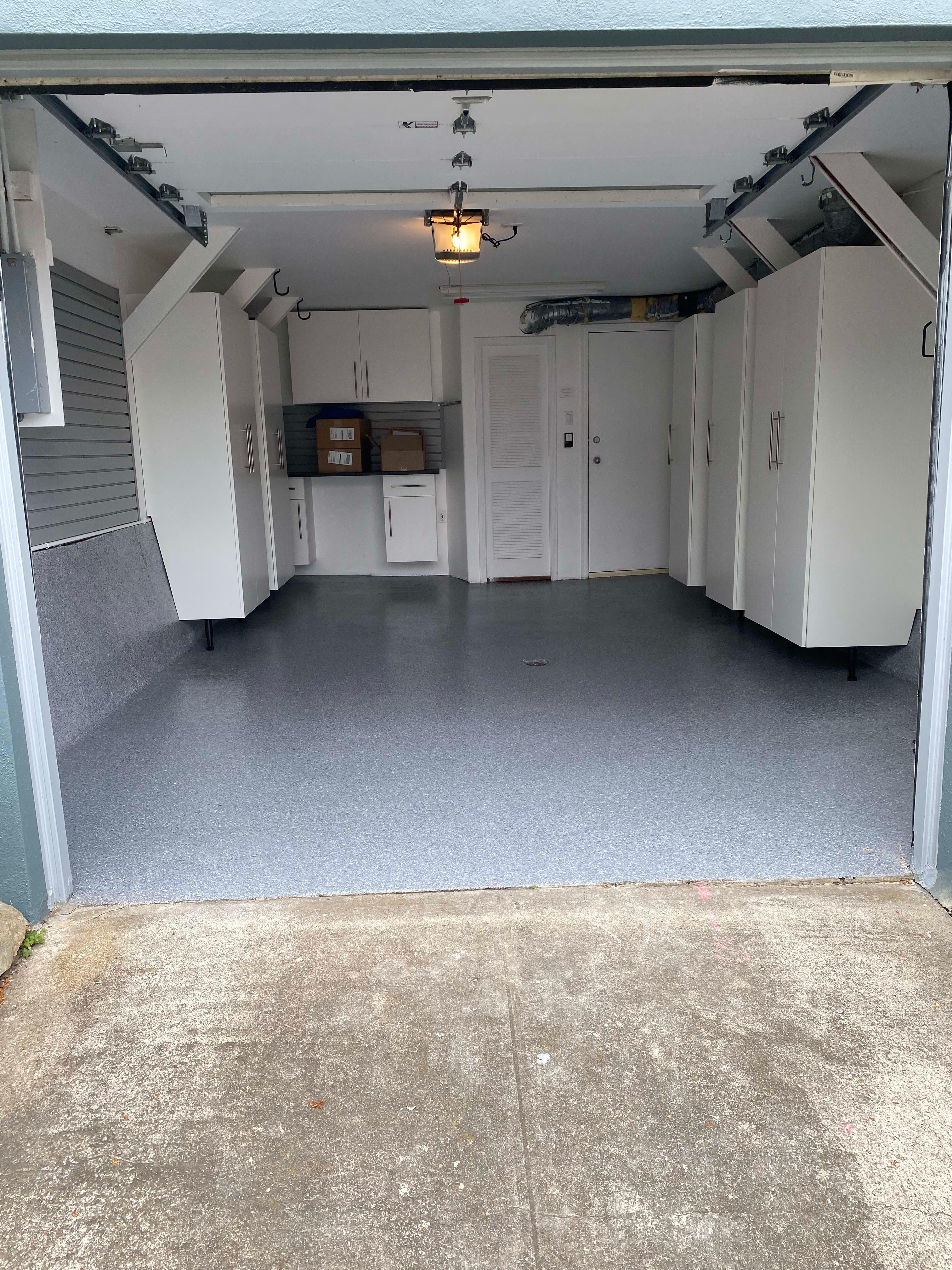 White Cabs, epoxy flooring & slatwall - Premier Garage of the Bay Area