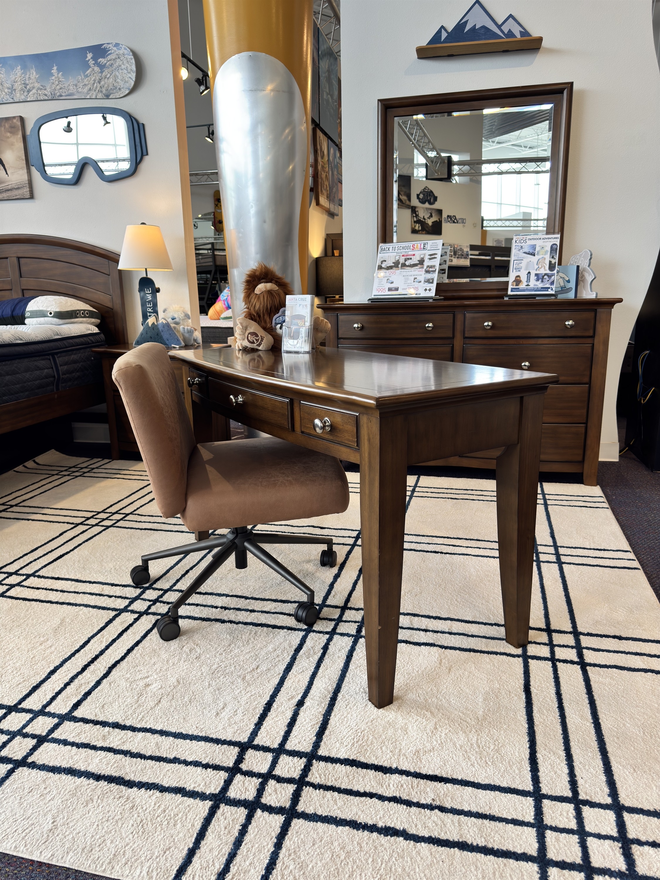 Explore this dark wood kids bedroom set with desk and dresser, showcased at Rooms To Go Kids in 2026.