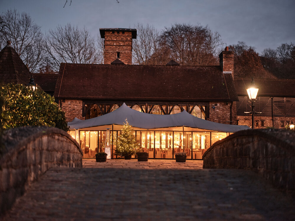 Evening exterior shot of The Barn at Coworth Park