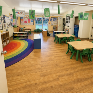Bright and colorful preschool classroom at Childcare Network with age-appropriate learning materials