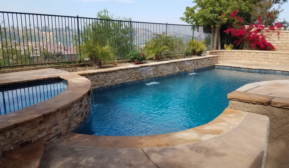 Custom Pool & Spa with Rock Retaining Wall & Water Feature