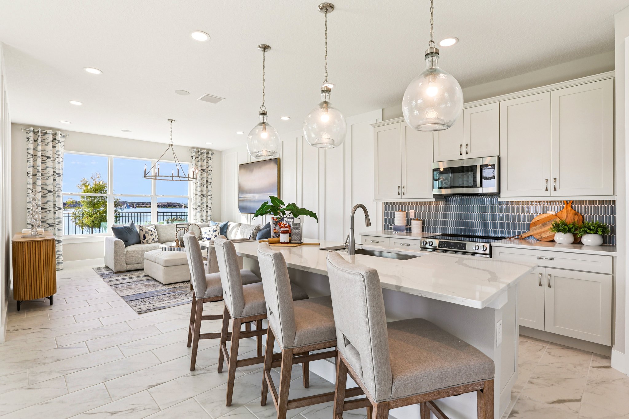 The Kitchen of a DRB Homes Bimini Home Plan at Isla Mirada in San Antonio, FL. 