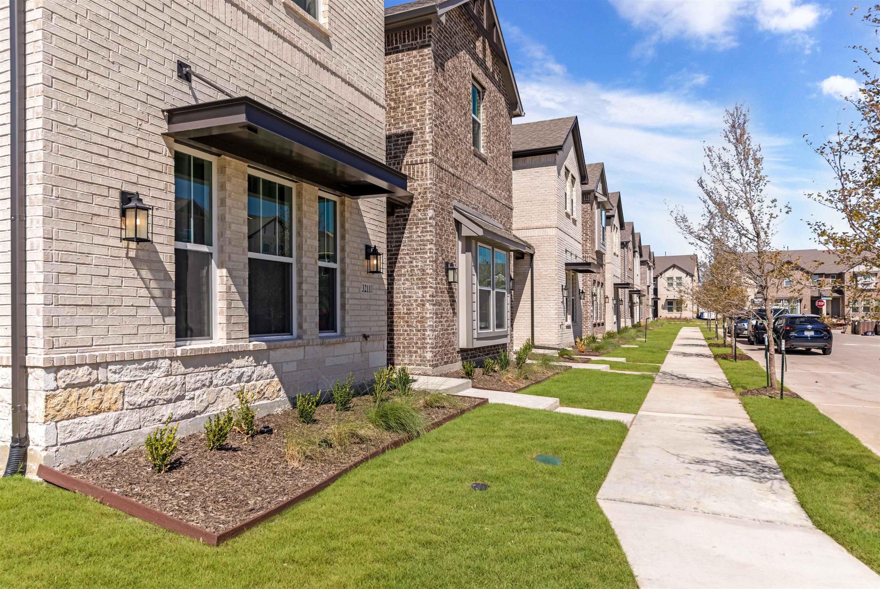 The  Station Townhomes by Ashton Woods in Sachse TX