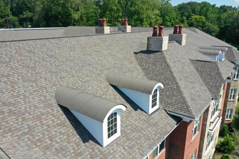 Roof Maintenance:
- Cleaning gutters and downspouts.
- Removing debris from the roof surface.
- Applying treatments to prevent moss or algae growth.
- Checking and maintaining the integrity of the roof structure.