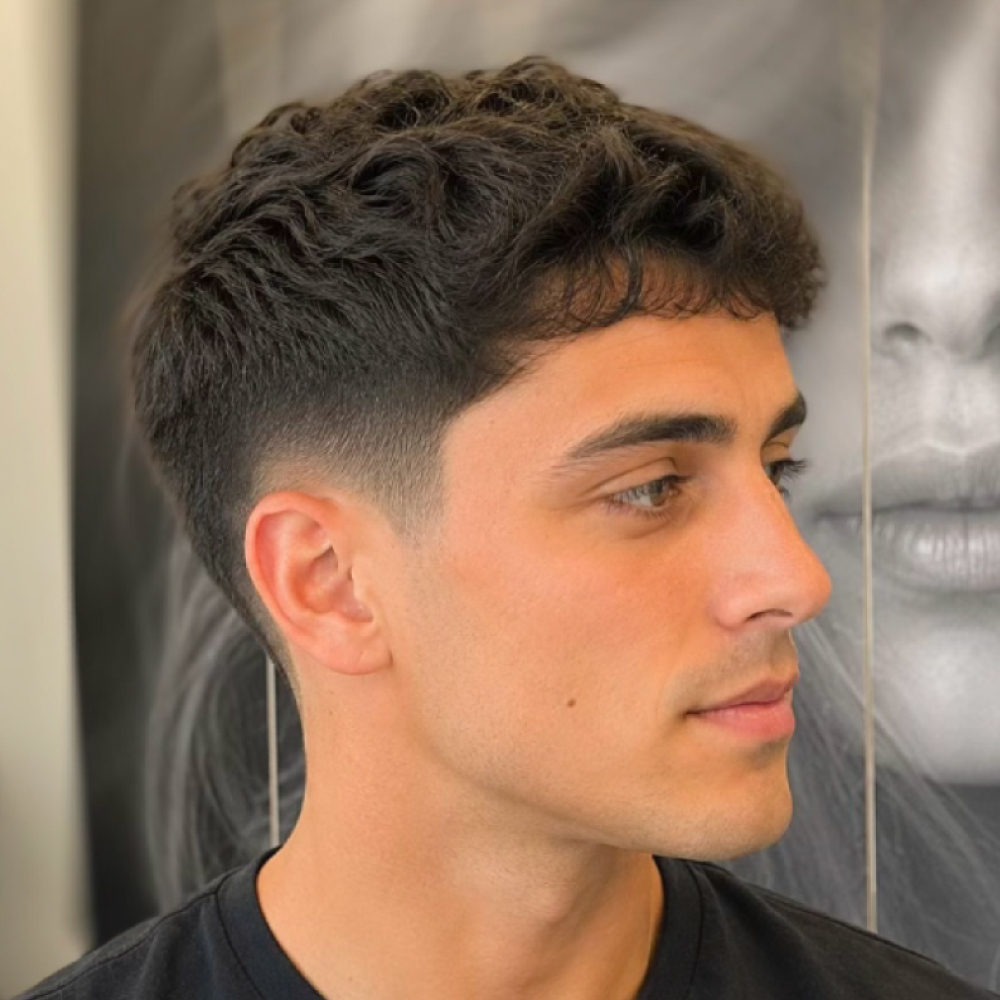 Modern men's haircut by the experienced barbers and stylists at Avissa Salon in Ann Arbor. Every cut 