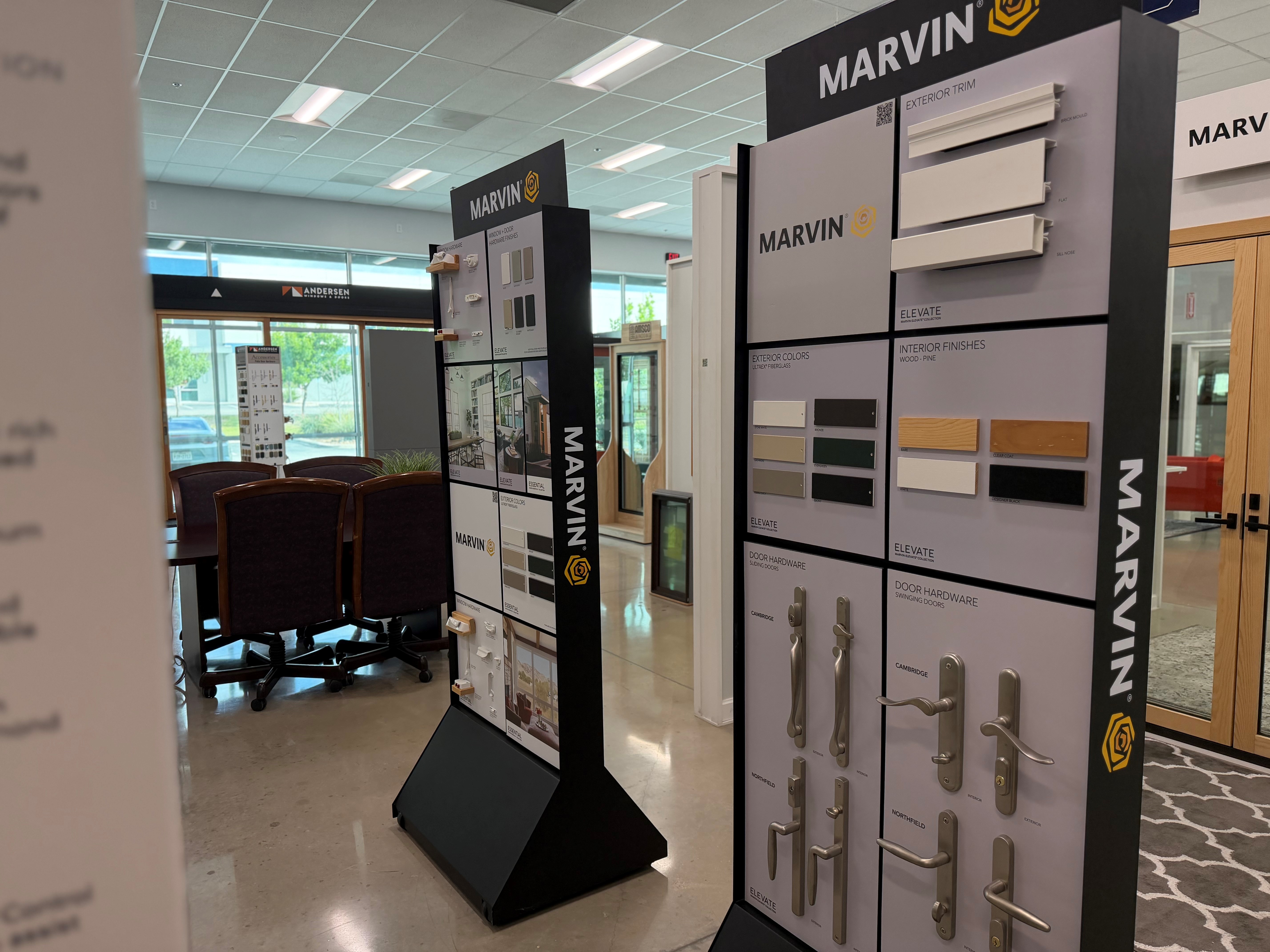 Marvin product display inside the Builders FirstSource showroom featuring window and door hardware,  