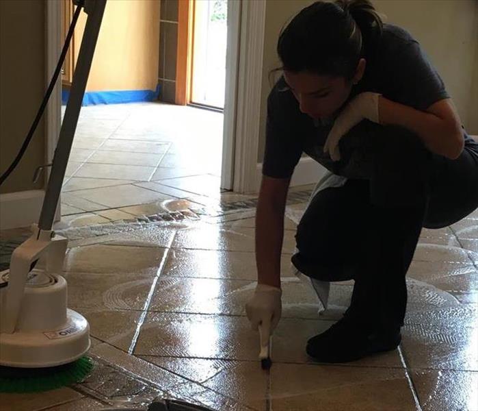 Cleaning a slate and tile floor often requires the use of a "floor machine" and hand cleaning techniques followed by applying a sealer coat and floor finish. Detail work like this brings the best results... happy customers.