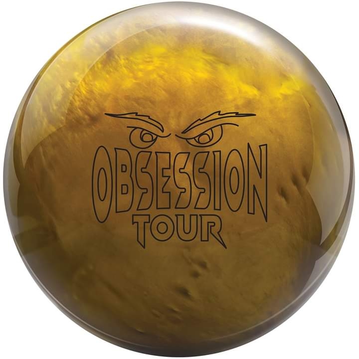 A close-up, studio shot of a gold bowling ball with a swirling, marbled pattern. The ball features a black graphic of intense eyes above the words "OBSESSION TOUR" in a stylized font.