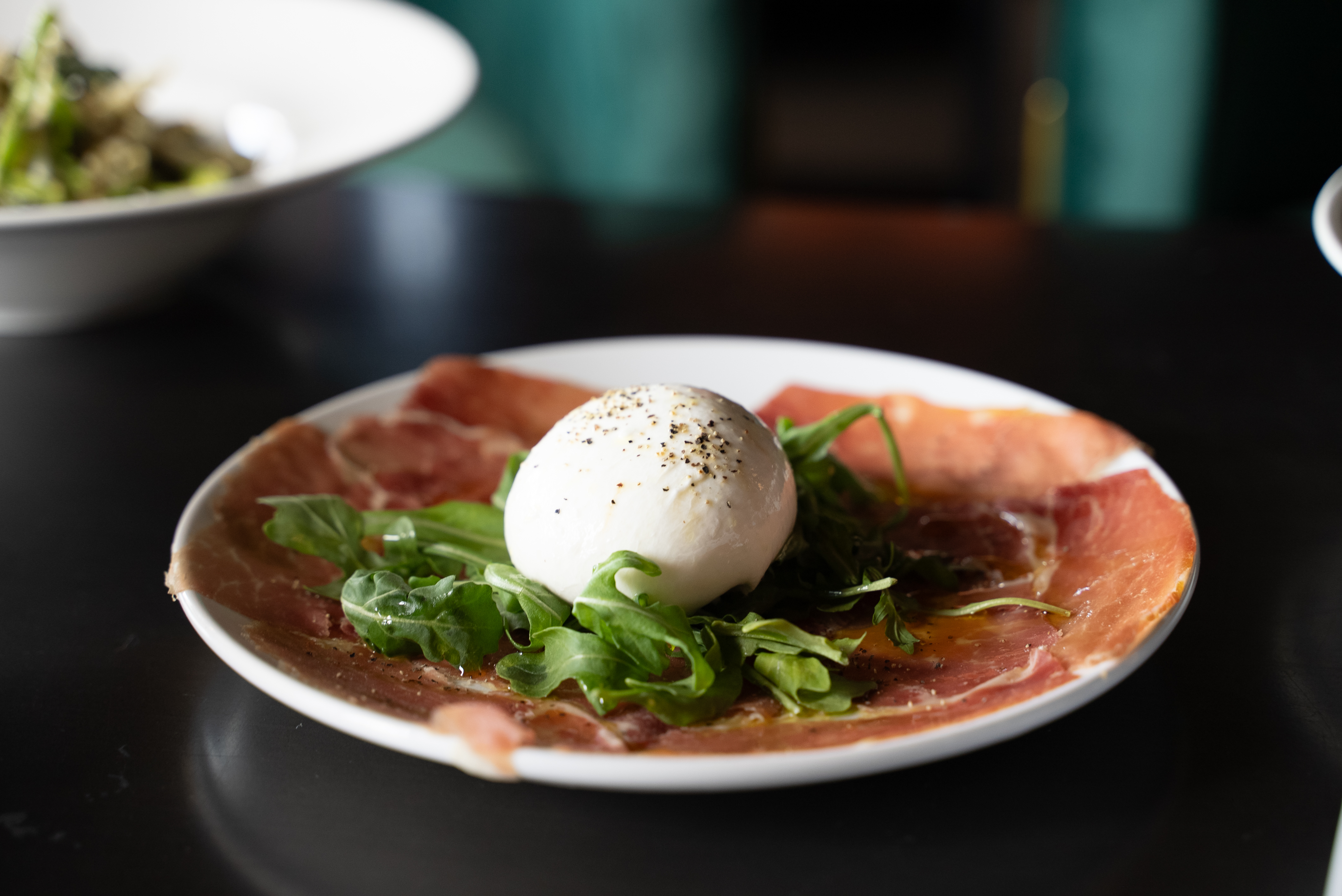 Fresh Italian Burrata and thinly sliced Prosciutto.