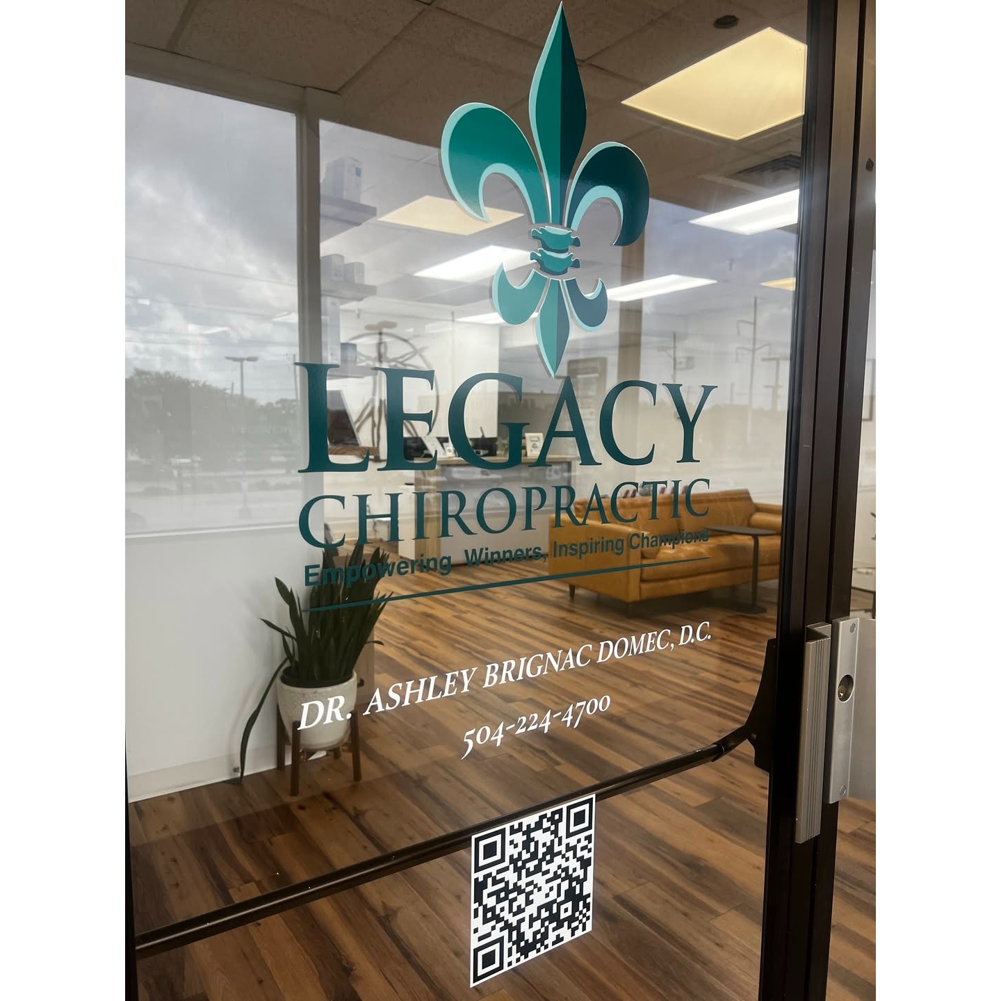 Front entrance of Legacy Chiropractic clinic in Metairie, Louisiana, featuring the practice logo and office information. Legacy Chiropractic provides professional chiropractic care, spinal adjustments, and pain relief treatments for patients in Metairie and the greater New Orleans area.