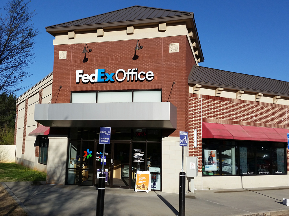 Exterior photo of FedEx Office location at 3370 Lawrenceville Suwanee Rd\t Print quickly and easily in the self-service area at the FedEx Office location 3370 Lawrenceville Suwanee Rd from email, USB, or the cloud\t FedEx Office Print & Go near 3370 Lawrenceville Suwanee Rd\t Shipping boxes and packing services available at FedEx Office 3370 Lawrenceville Suwanee Rd\t Get banners, signs, posters and prints at FedEx Office 3370 Lawrenceville Suwanee Rd\t Full service printing and packing at FedEx Office 3370 Lawrenceville Suwanee Rd\t Drop off FedEx packages near 3370 Lawrenceville Suwanee Rd\t FedEx shipping near 3370 Lawrenceville Suwanee Rd