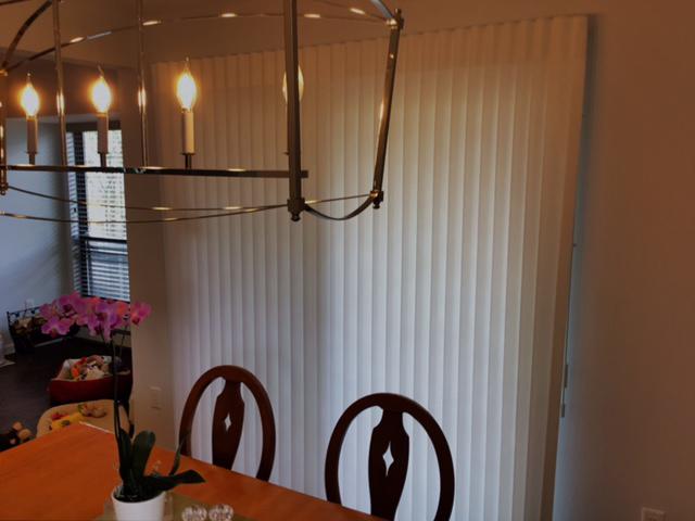 Check out these Smart Drapes we installed in Ossining. They perfectly complement these gorgeous lights, while blocking the sunlight pouring in from the sliding glass door, setting the perfect mood!