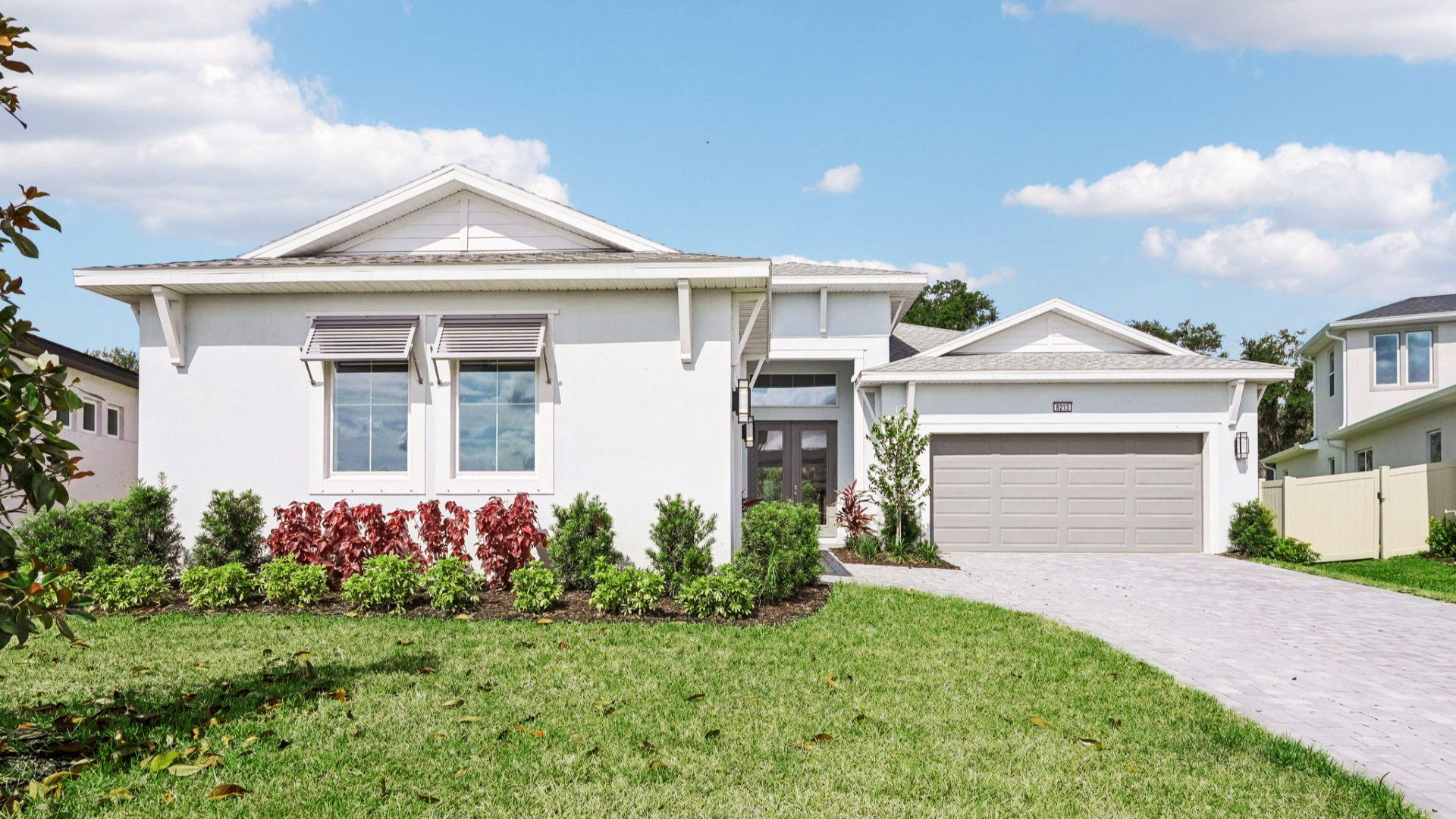 The Front Elevation of a DRB Homes Quick Move-In Home at Biscayne Landing at Seaire in Parrish, FL.