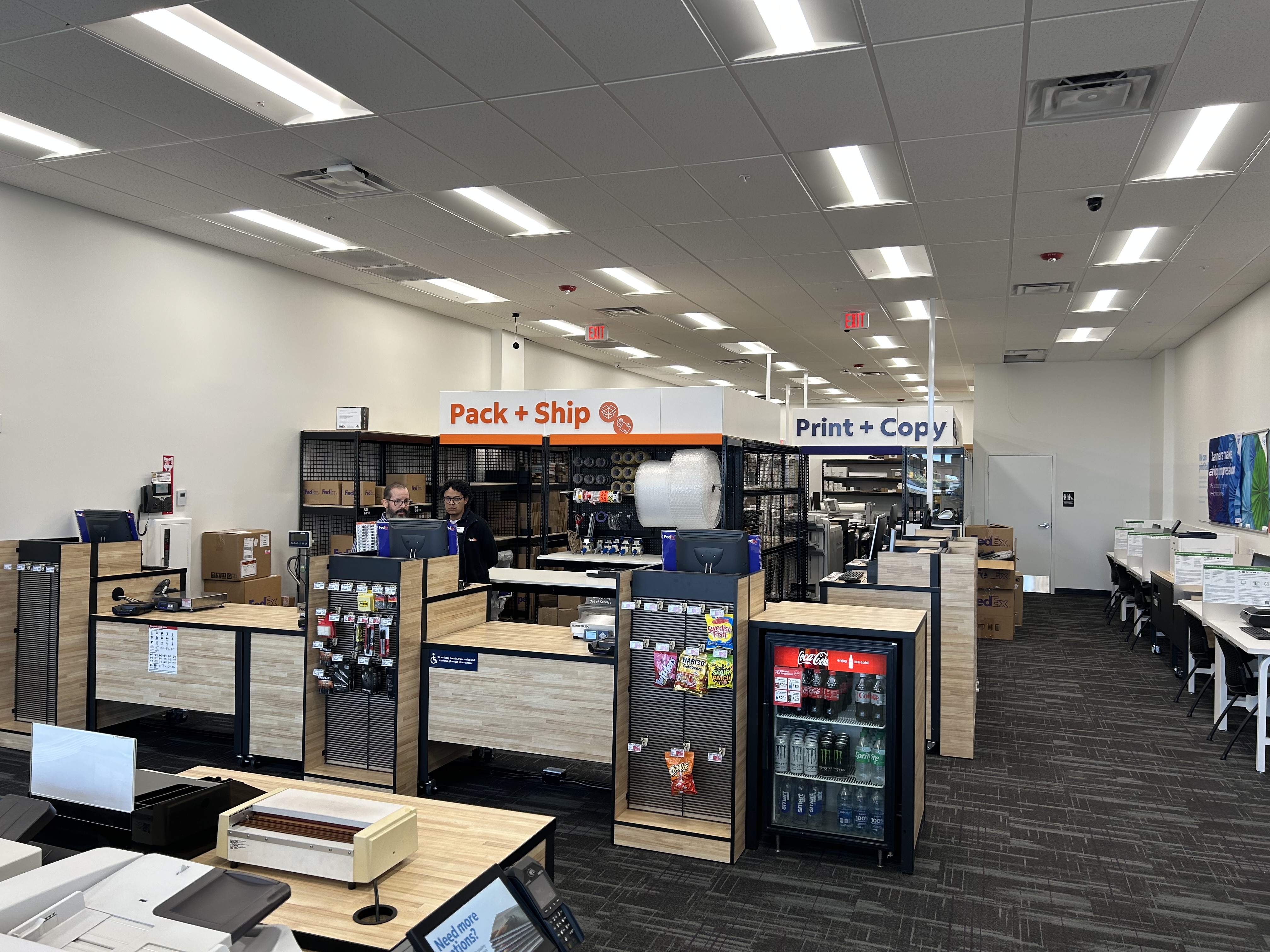 Pack and ship and print service counters at FedEx Office North Miami FL with staff assistance, shipping services, and retail products.