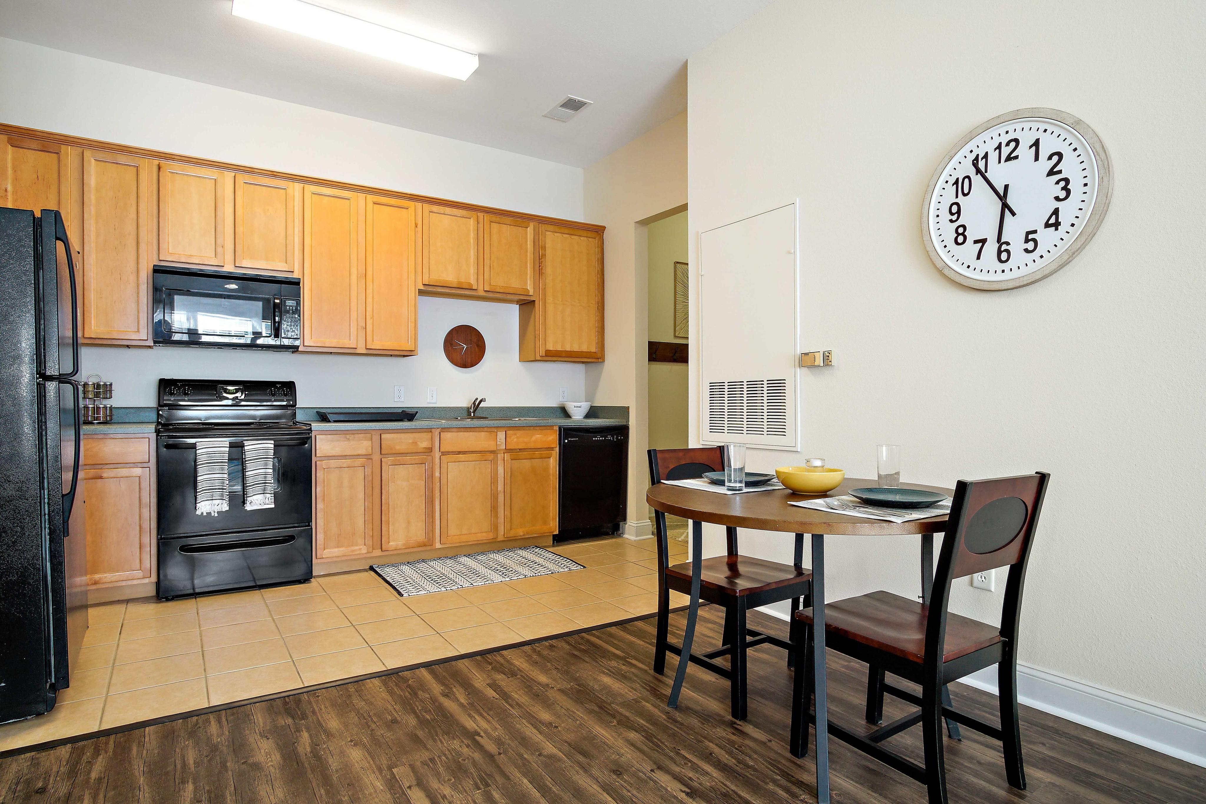 Open concept living with dining area and kitchen. Central House on Stadium Apartments Mobile (251)272-4710