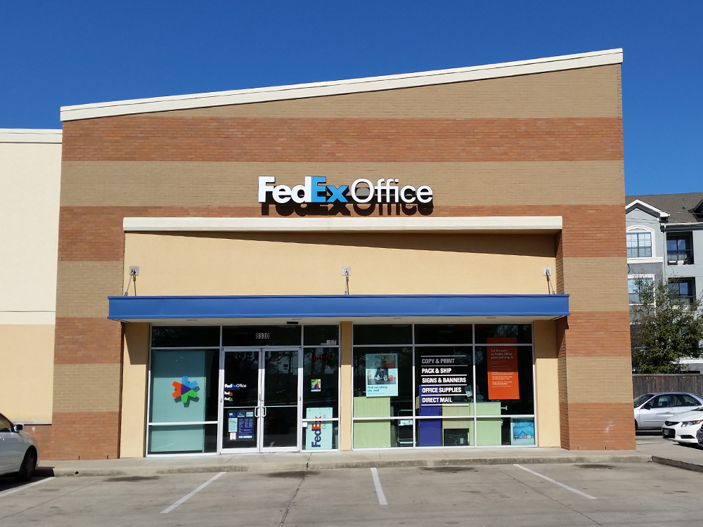 Exterior photo of FedEx Office location at 8330 S Main St\t Print quickly and easily in the self-service area at the FedEx Office location 8330 S Main St from email, USB, or the cloud\t FedEx Office Print & Go near 8330 S Main St\t Shipping boxes and packing services available at FedEx Office 8330 S Main St\t Get banners, signs, posters and prints at FedEx Office 8330 S Main St\t Full service printing and packing at FedEx Office 8330 S Main St\t Drop off FedEx packages near 8330 S Main St\t FedEx shipping near 8330 S Main St