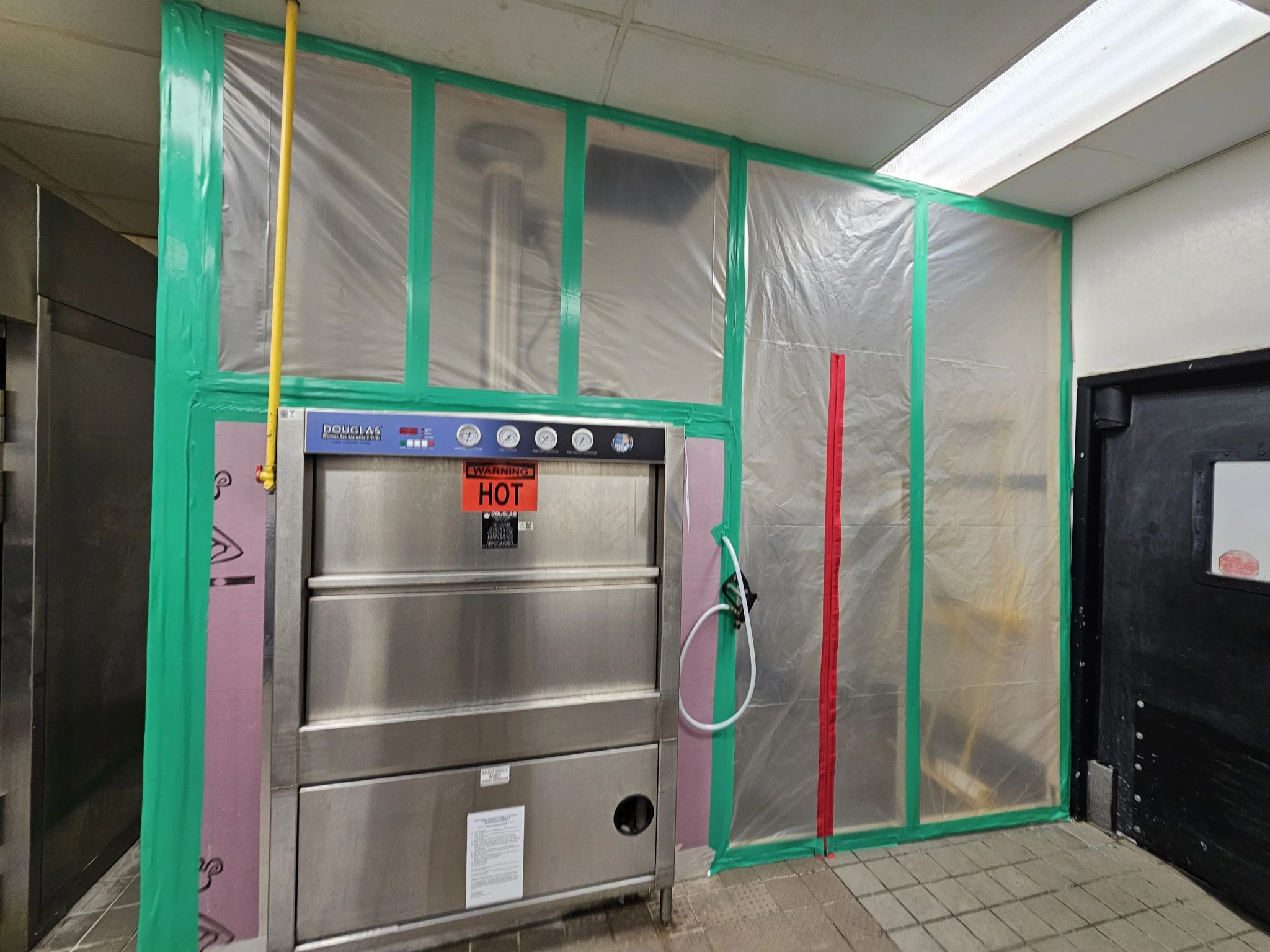 servpro water damage cleanup in contained area in commercial facility