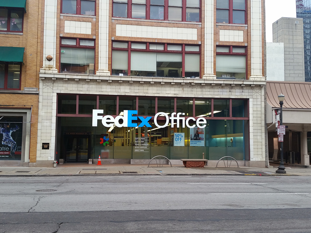 Exterior photo of FedEx Office location at 315 W Market St\t Print quickly and easily in the self-service area at the FedEx Office location 315 W Market St from email, USB, or the cloud\t FedEx Office Print & Go near 315 W Market St\t Shipping boxes and packing services available at FedEx Office 315 W Market St\t Get banners, signs, posters and prints at FedEx Office 315 W Market St\t Full service printing and packing at FedEx Office 315 W Market St\t Drop off FedEx packages near 315 W Market St\t FedEx shipping near 315 W Market St