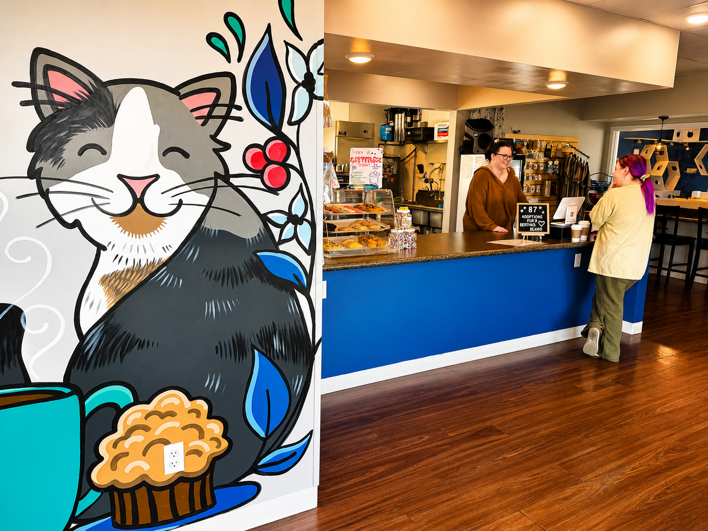 Welcome to Bertha's Beans Cat Café! Enjoy fresh coffee, friendly service, and a cozy space featuring 