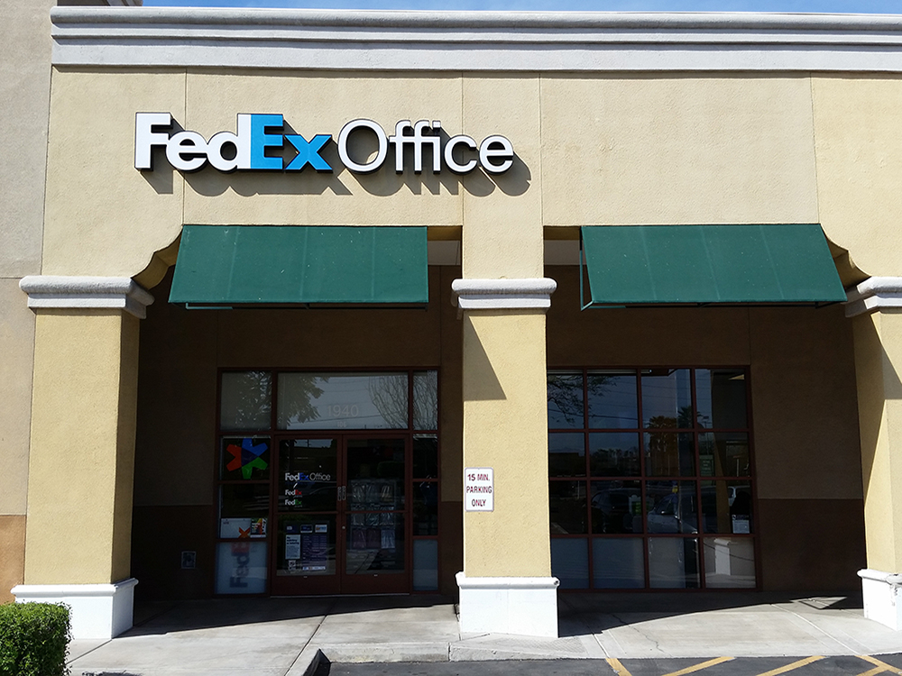 Exterior photo of FedEx Office location at 1940 S Val Vista Dr\t Print quickly and easily in the self-service area at the FedEx Office location 1940 S Val Vista Dr from email, USB, or the cloud\t FedEx Office Print & Go near 1940 S Val Vista Dr\t Shipping boxes and packing services available at FedEx Office 1940 S Val Vista Dr\t Get banners, signs, posters and prints at FedEx Office 1940 S Val Vista Dr\t Full service printing and packing at FedEx Office 1940 S Val Vista Dr\t Drop off FedEx packages near 1940 S Val Vista Dr\t FedEx shipping near 1940 S Val Vista Dr